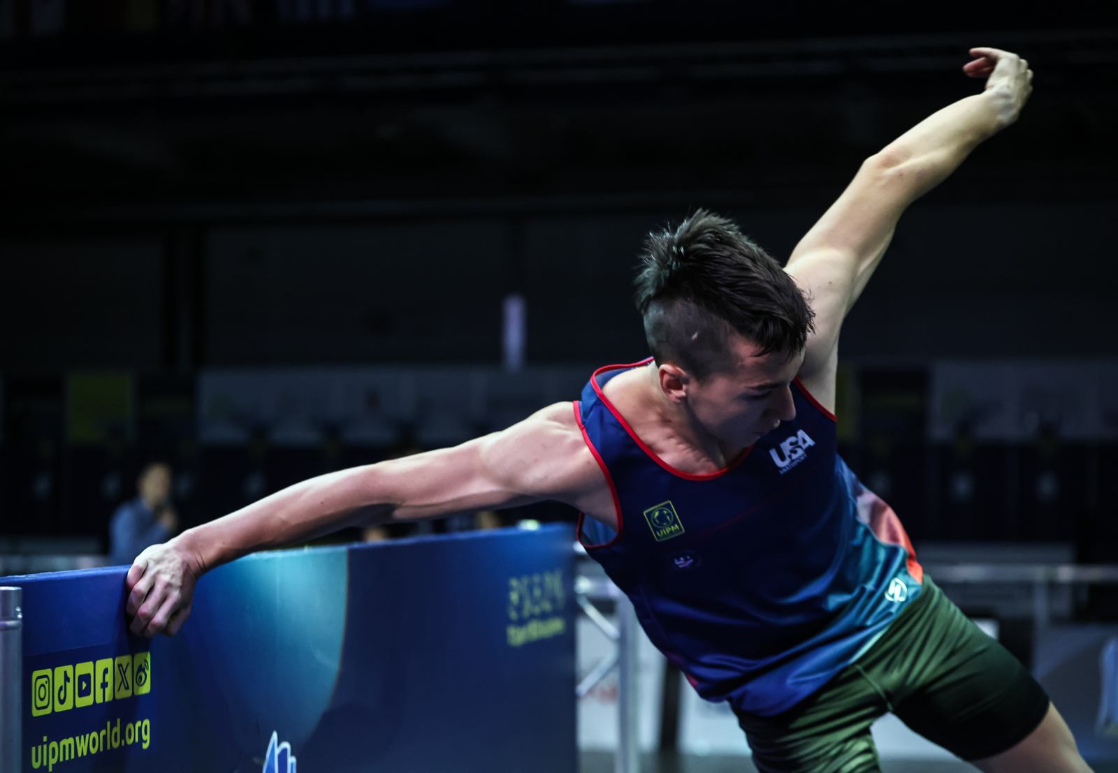 Flying over an obstacle in the Team USA jersey